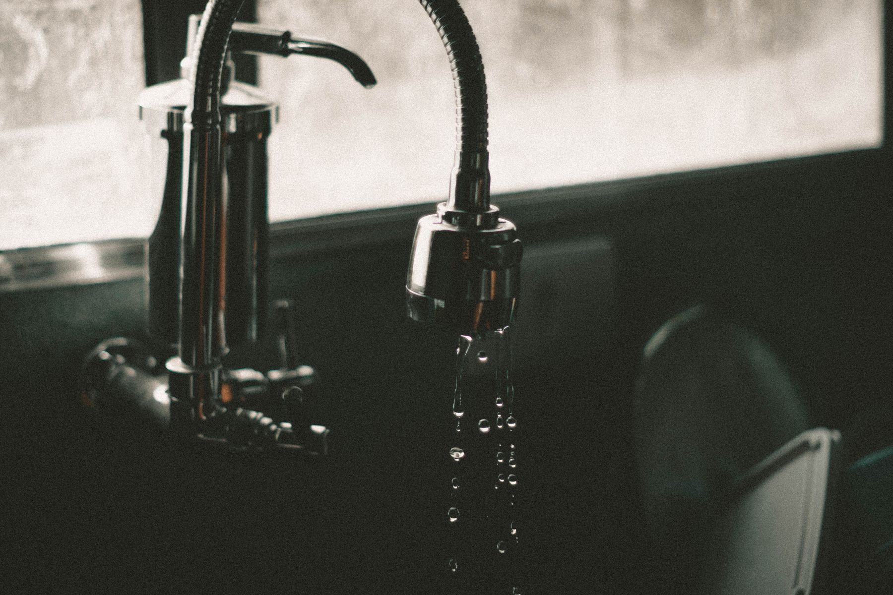 Water dripping from a kitchen tap